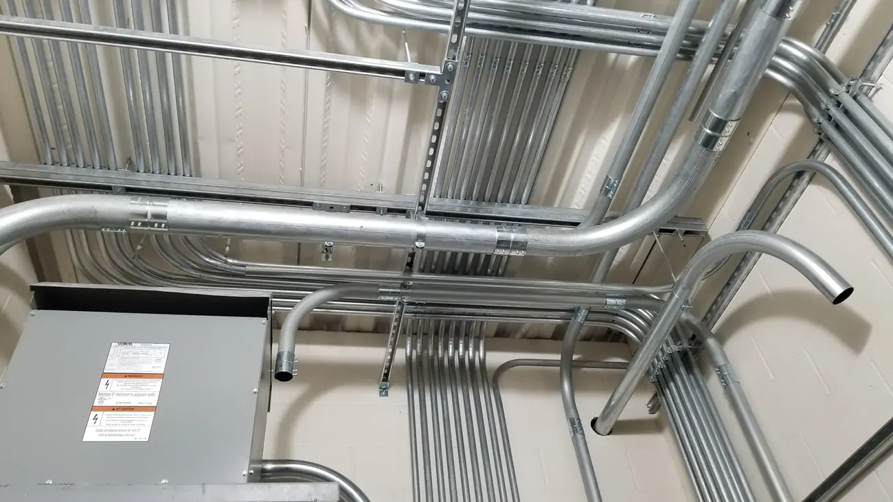 Neat commercial conduit runs installed by T&G Electric